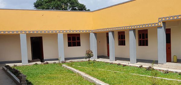 Construction of school classroom, school library and community health center